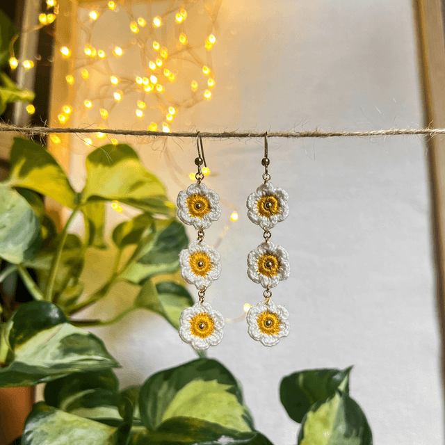 Longues boucles d’oreilles pâquerettes
